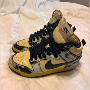 Nike Dunk 1985 high top.